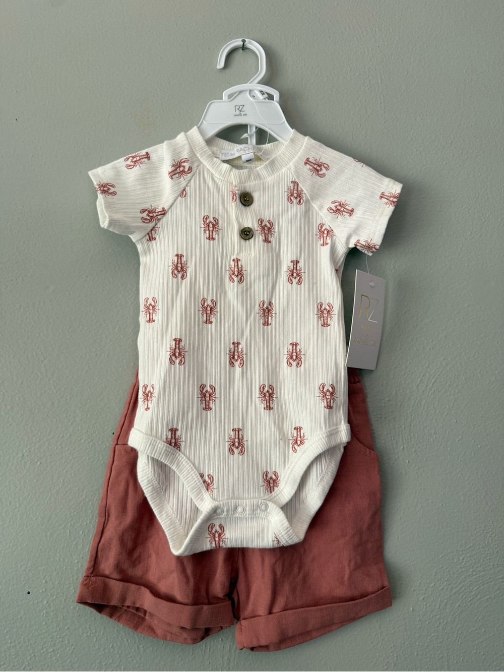 Rachel Zoe Baby Cream Onesie with Rust Lobster Print